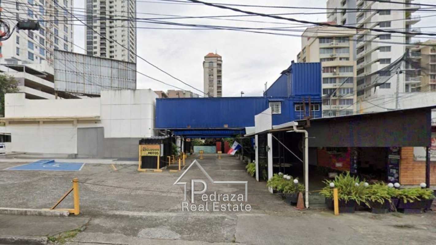 Busy intersection aerial of commercial corner property with access Via España and Av. Porras Panama City