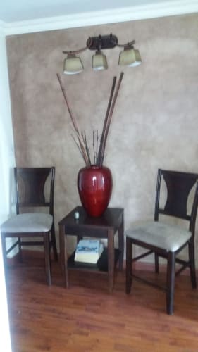 Spacious living room with wood floors and city view in PH Miraflores Tower Betania Panama