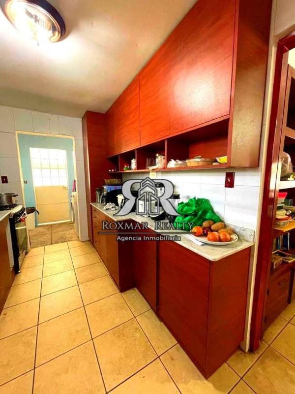 Covered terrace balcony overlooking neighborhood with iron railings Brisas del Golf Panama