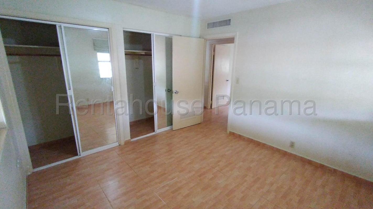 Bright bedroom with tile floors, AC, closets and large windows in Clayton Panama house for rent