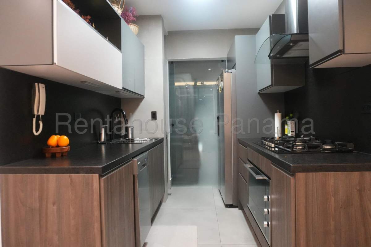 Modern kitchen with integrated cabinetry, granite counters at PH Victory Sport Panama