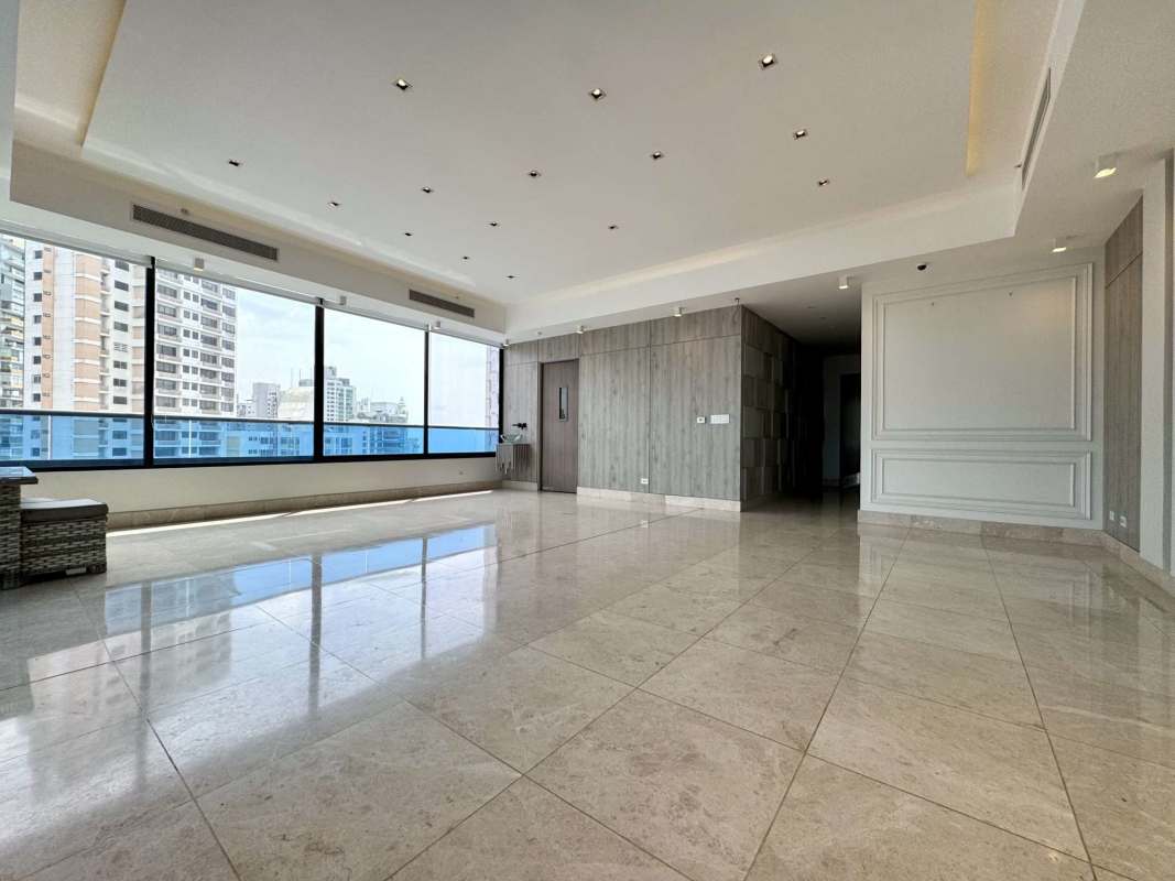 Luxury apartment bright living area with panoramic city view windows PH Deluxe Residences Panama City