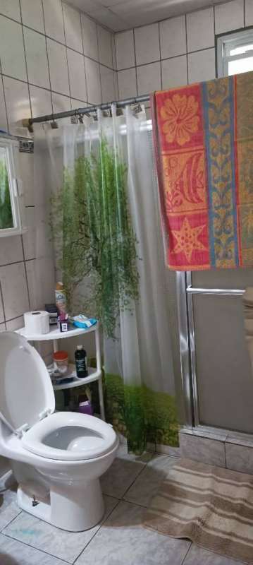 Large landscaped backyard garden with tropical vegetation and fountain Cerro Azul Panama