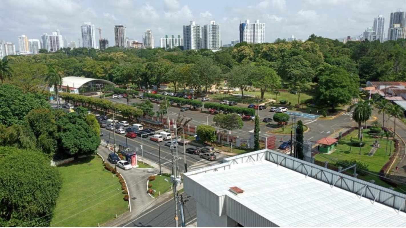 Contemporary bathroom with gray tiles, walk-in shower, vanity and mirror in PH San Francisco Park Panama City