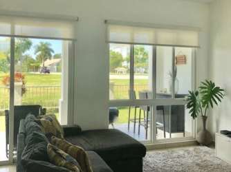 Kitchen area with granite countertops in Bijao Beach Club condo in Panama for sale