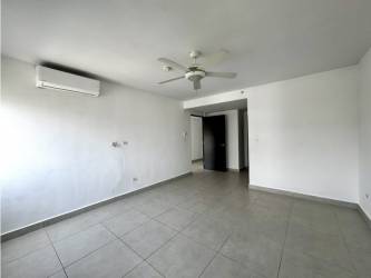 Master bedroom with large window, walk-in closet, mountain views in PH Midrise Panama Pacifico