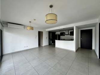 Spacious living and dining room with panoramic windows at PH Midrise Panama Pacifico