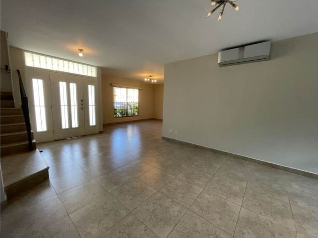 Spacious covered patio terrace with ceiling fan and garden view in Embassy Gardens Clayton Panama