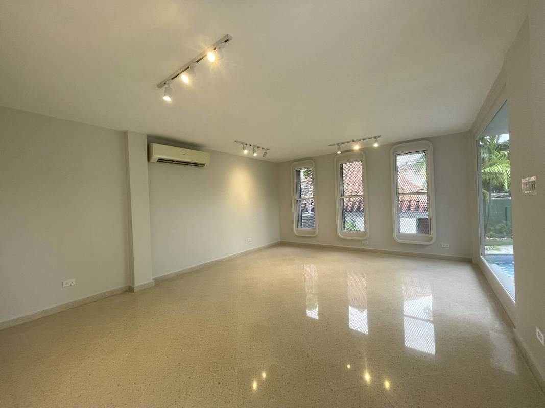 Spacious dining and living room area with large windows in San Francisco Panama