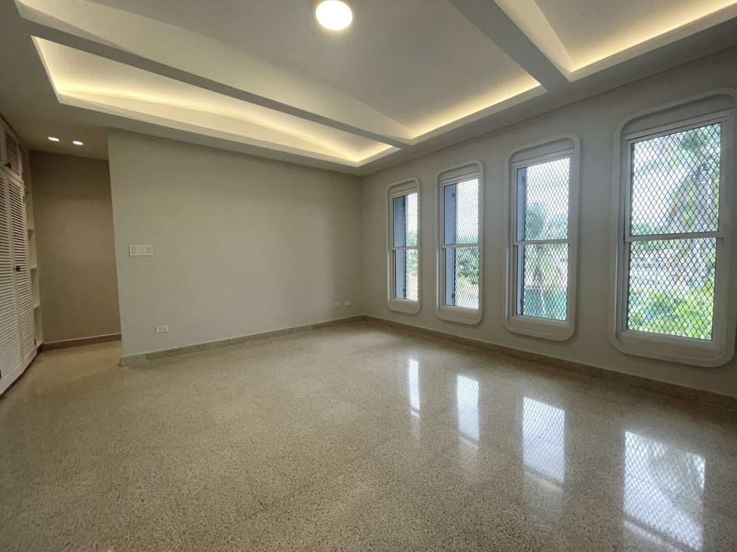 Modern minimalist living room with natural light, sleek finishes in San Francisco Panama