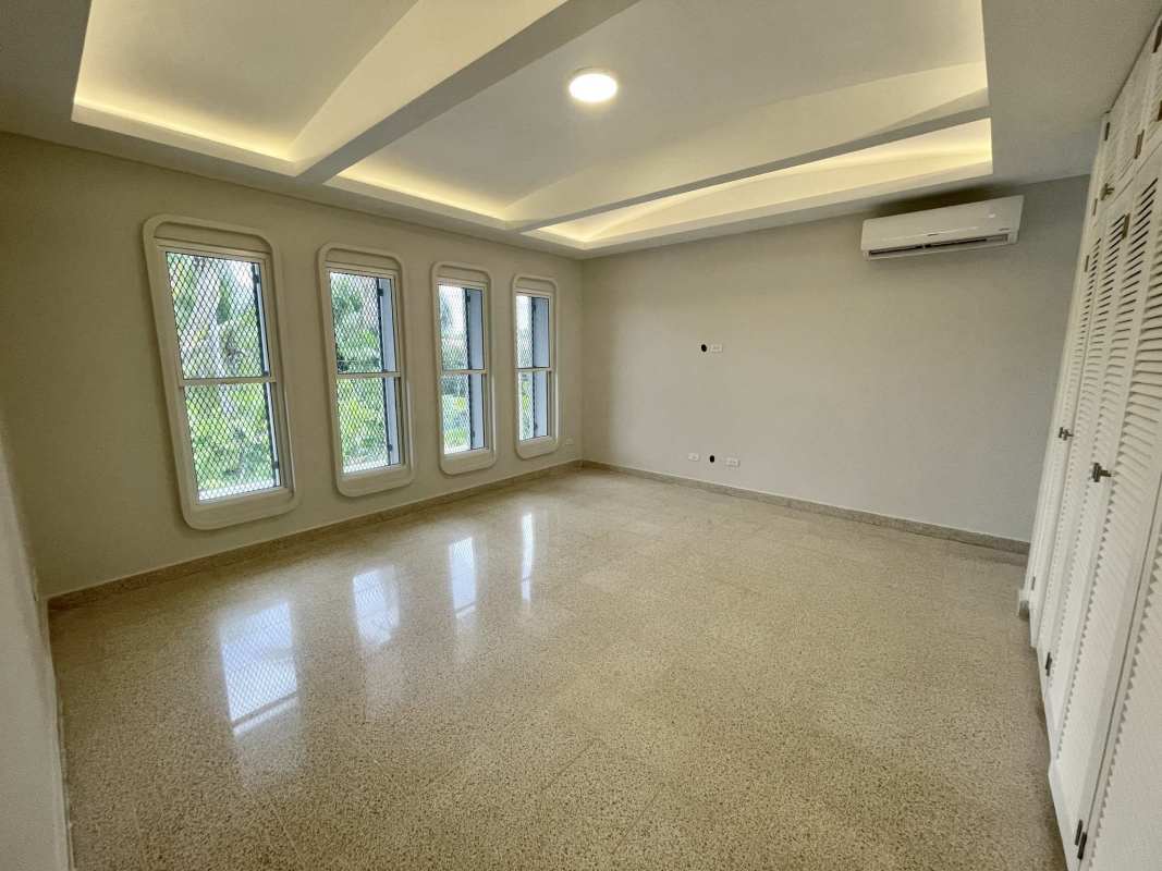 Elegant bathroom with pedestal sink, large mirror, modern lighting San Francisco Panama City