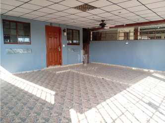 Second bedroom with tiled floors and security grilles in Vista Alegre Panama