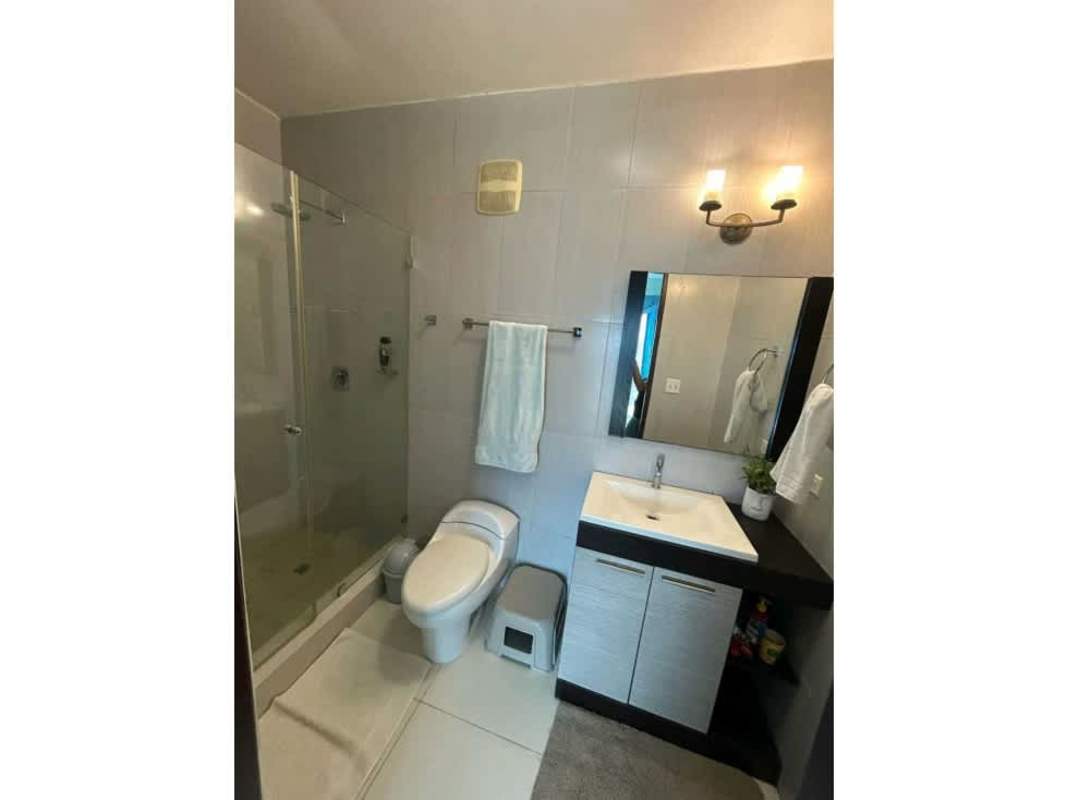 Modern furnished bedroom in PH Park Loft with city view Panama