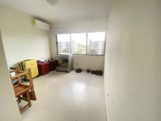 Bright smaller bedroom with windows and AC in PH Woodlands rental Panama Pacifico