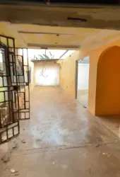 Secured patio hallway arched doorway enclosed concrete floor Burunga Panama house rental