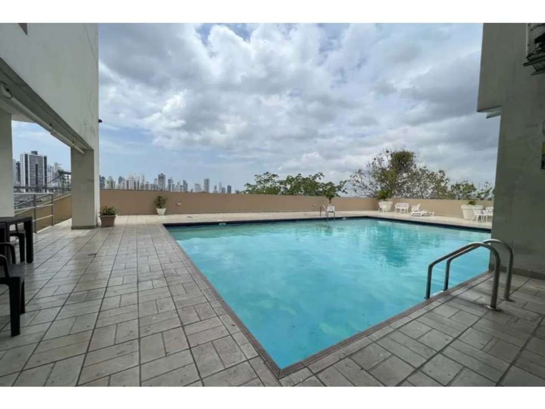 Swimming pool with deck and skyline view PH Majestic Gardens Edison Park Panama City