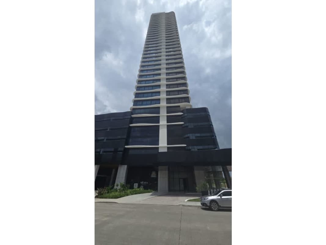 Modern kitchen with marble countertops, stainless appliances, pendant lights PH Arcadia Costa del Este Panama