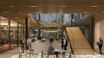 Contemporary lobby with co-working tables, greenery, stairs at PH Centriqo in Panama Pacifico