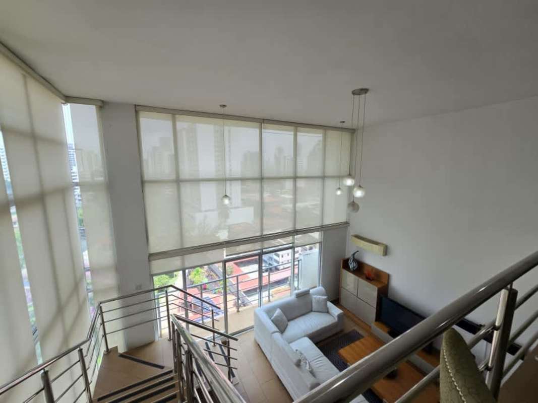 Spacious loft style master bedroom with en-suite bath and large windows in PH El Cangrejo Loft Panama