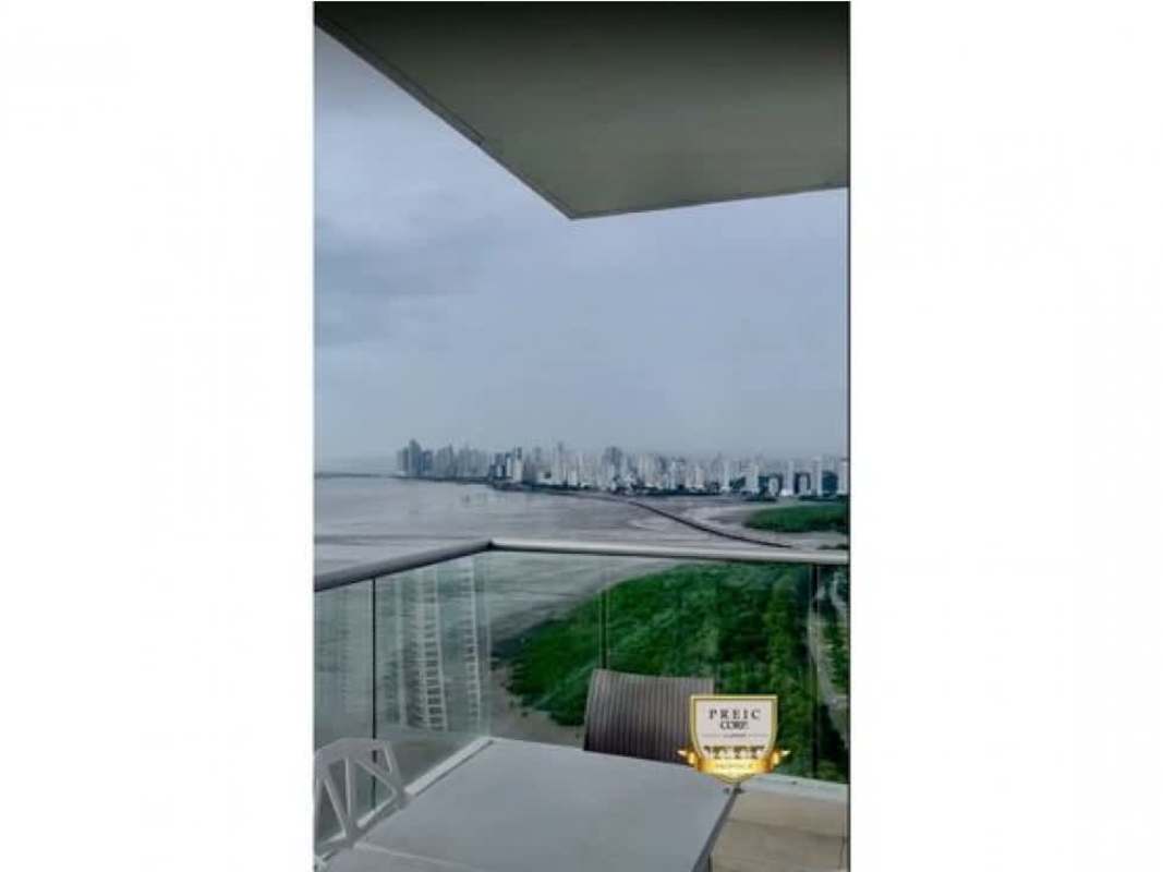 Spacious master suite with glass wall, balcony access and ocean views in high floor PH Mirador Costa del Este