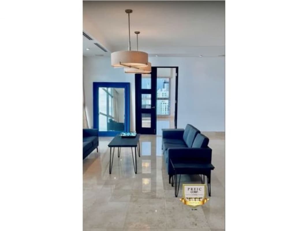 Spacious dining area with marble flooring, large table, ocean views from PH Mirador Costa del Este Panama City