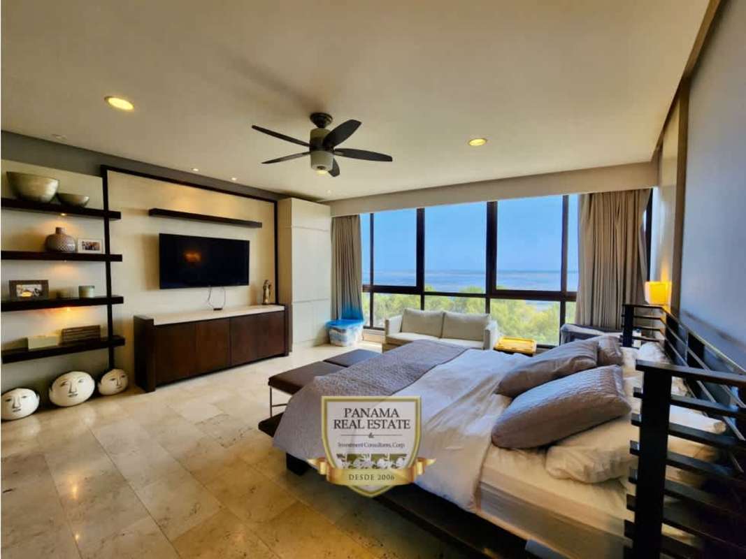 Outdoor BBQ kitchen and seating terrace with ocean views at PH Panama Bay Costa del Este Panama