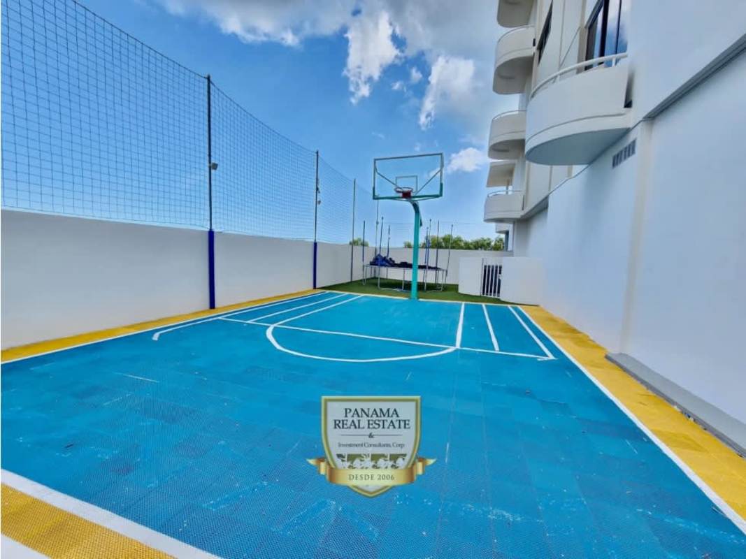 Luxury infinity swimming pool with palm trees and sea views in PH Panama Bay Costa del Este Panama