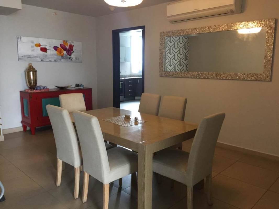Modern bathroom with double vessel sinks and glass-enclosed shower in PH Country Club Costa del Este Panama apartment