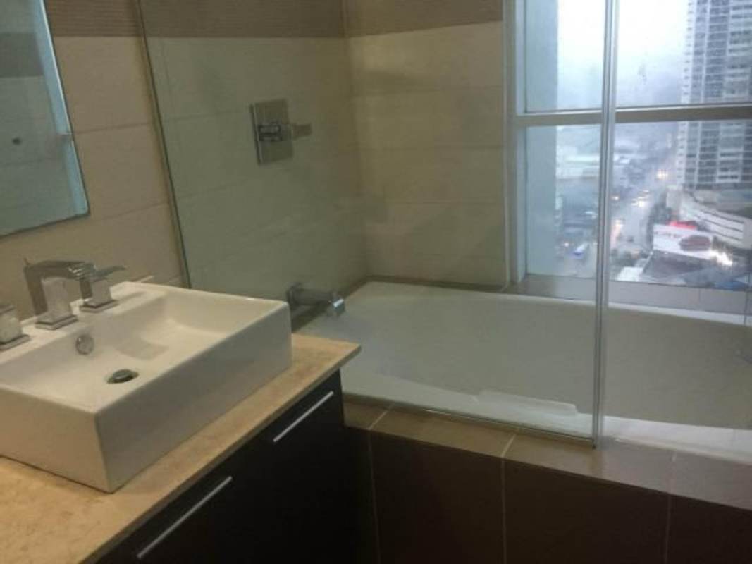 Contemporary apartment kitchen with granite countertops in PH Country Club Costa del Este Panama