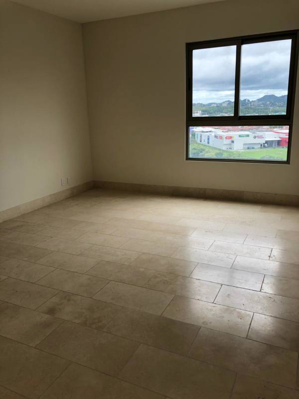 Main bedroom in PH GreenView with panoramic window, city and golf views