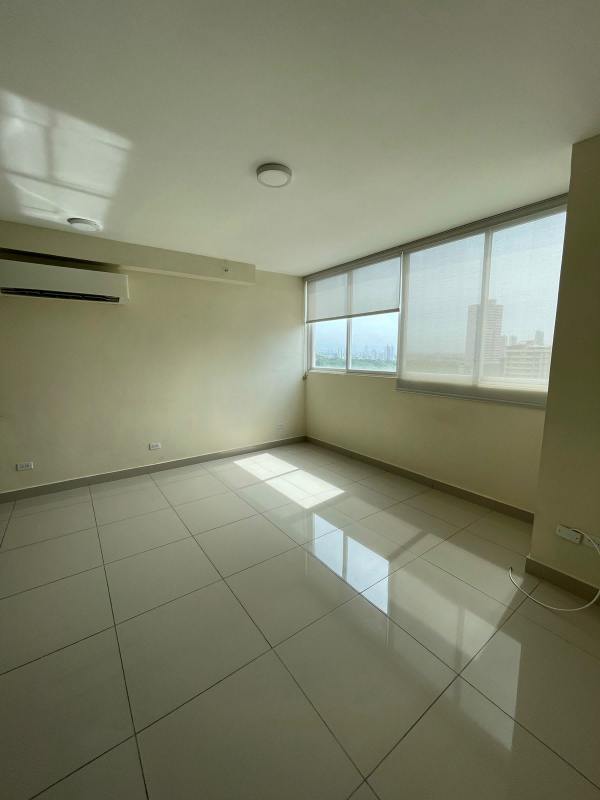 Open kitchen with modern cabinetry and granite countertops in PH Red Point Panama