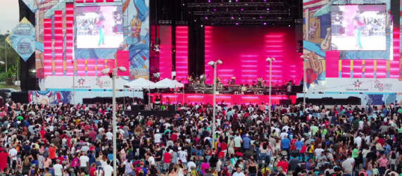 Aerial and facade view of Santiago Mall with large parking and main frontage Veraguas Panama