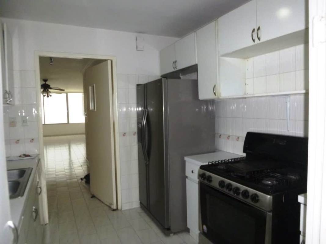 Empty bedroom with ceiling fan, tiled floor and closet in apartment for rent at PH Ocean View San Francisco Panama