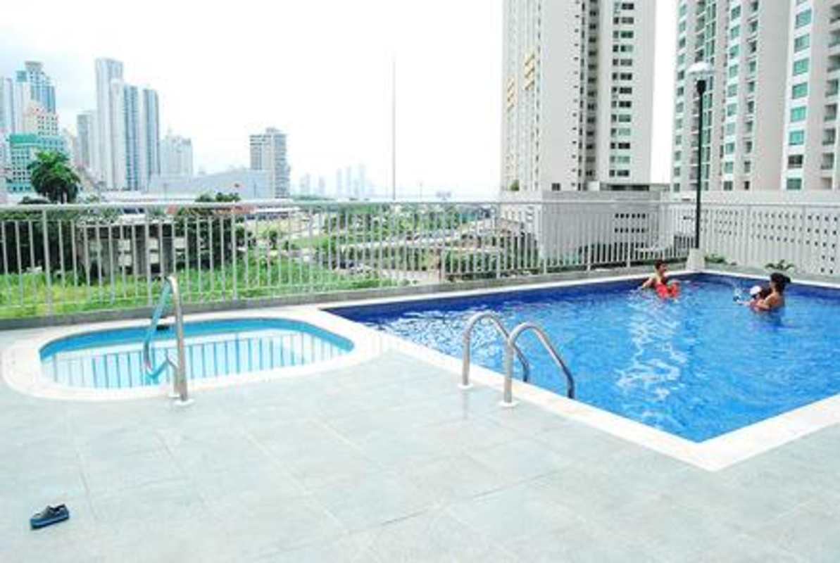 Swimming pool with city skyline view in PH San Francisco Bay Panama City