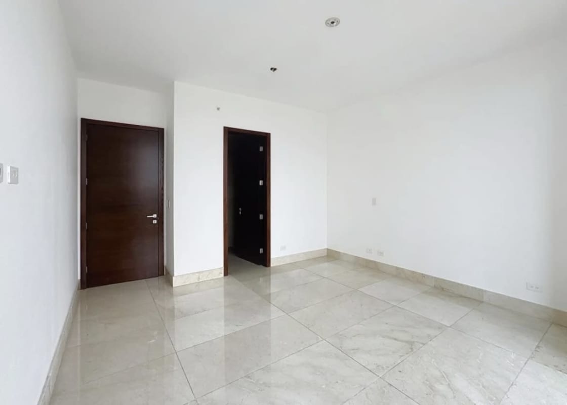 Open concept living dining with marble floors floor-to-ceiling windows at PH Azalea Panama City