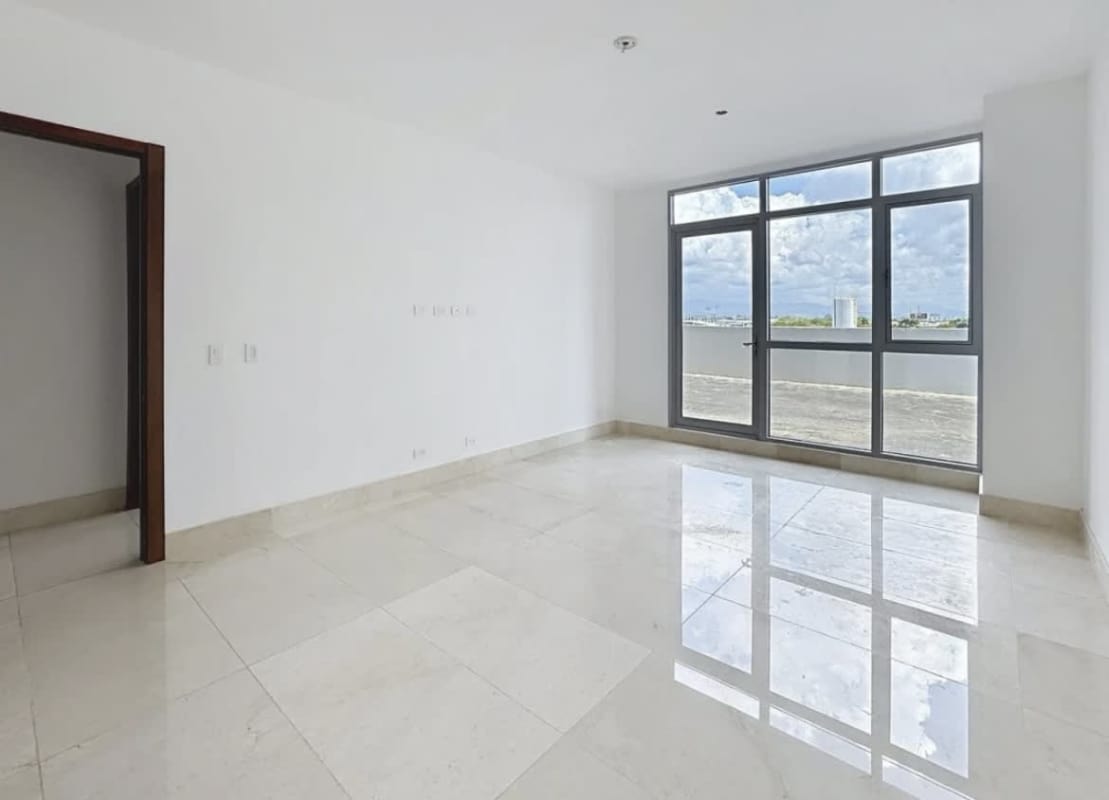 Modern open living room with marble floor, floor-to-ceiling windows, balcony in PH Azalea Santa María Panama
