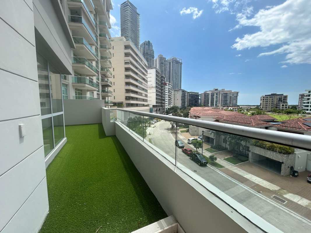 Private balcony terrace with glass railing and panoramic golf and city views PH Azalea Santa María Panama