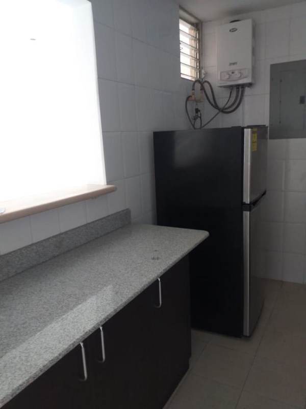 Modern kitchen granite countertop laundry area PH Majestic Panama City