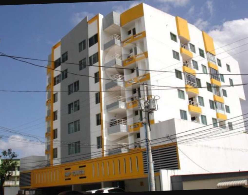 Bedroom with large window, ceiling fan, neutral tile floors, in PH HIP Tower Panama