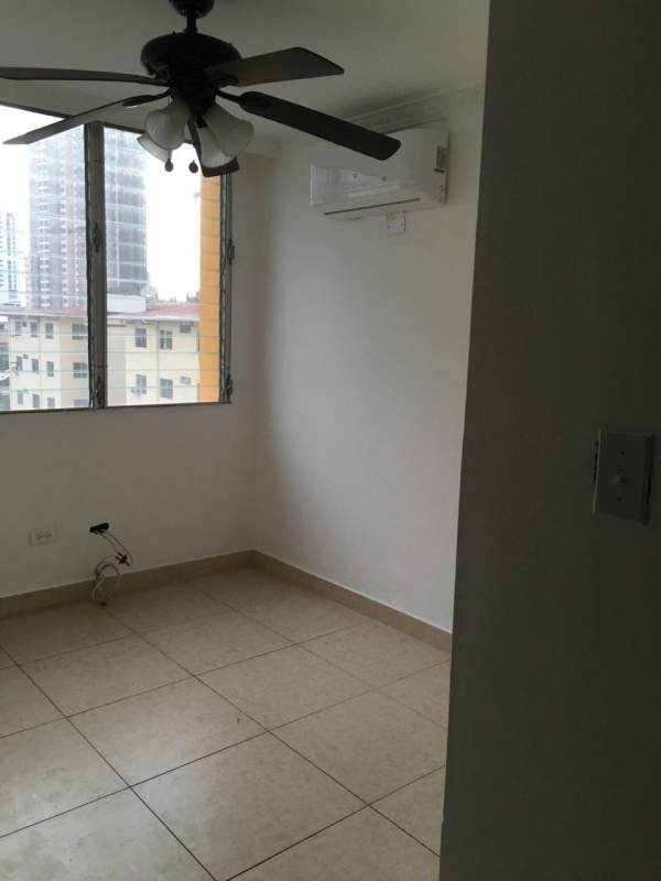 Multi-story residential building with balconies and parking PH HIP Tower Panama City