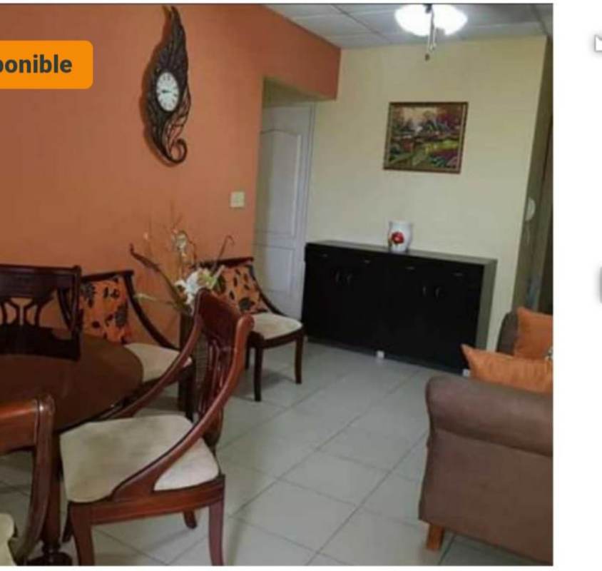 Living and dining area with wood furnishings rental apartment Campo Limberg Panama