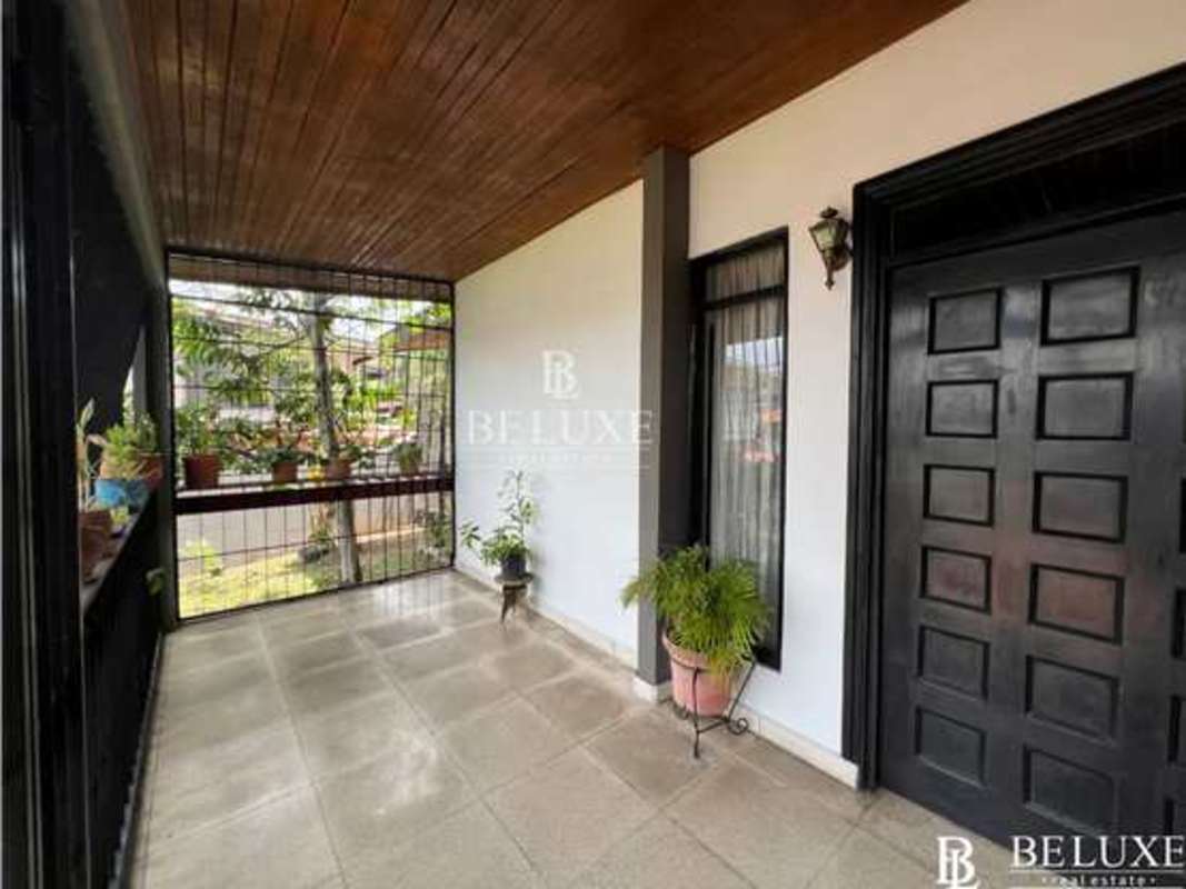 Dining room with chandelier wood ceiling ceramic floor Panama