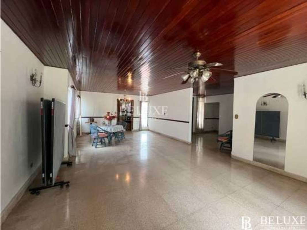 Large kitchen with wooden cabinets granite countertops El Dorado Betania house