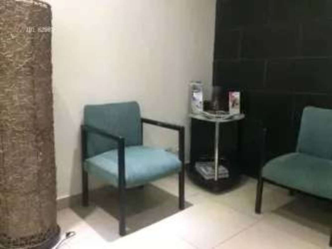 Simple bathroom with sink, toilet, tiled wall at PH Plaza Hato Pintado Panama City