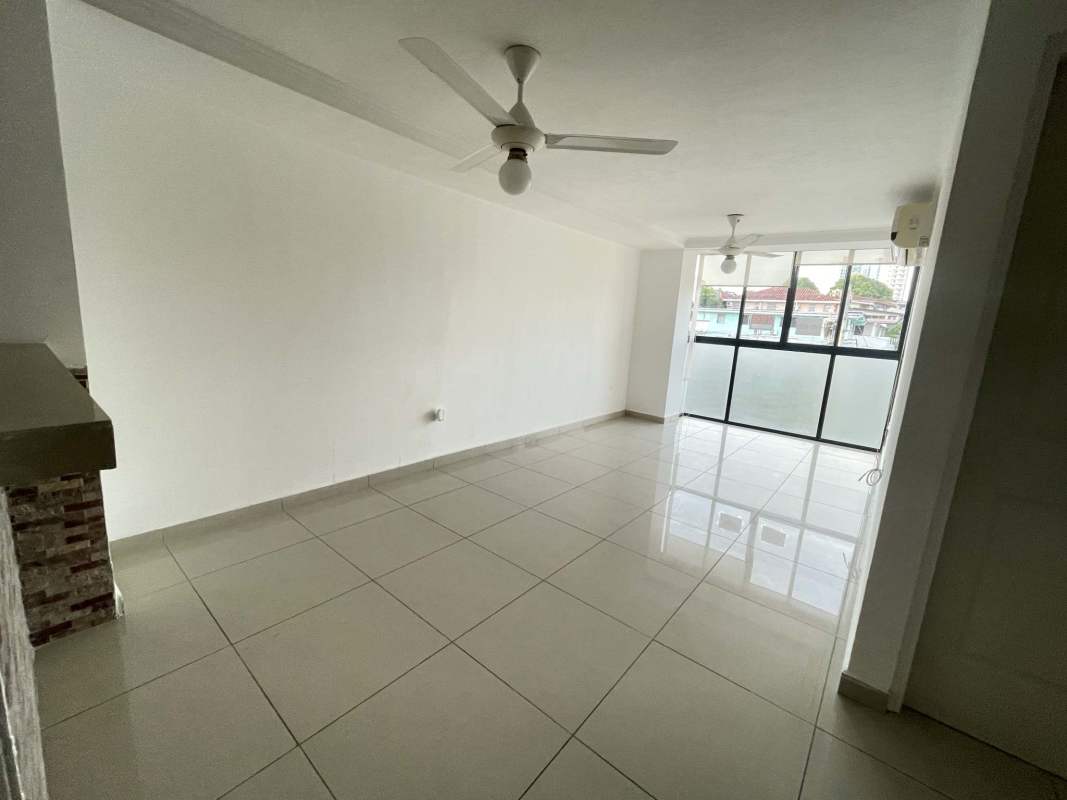 Open living dining room with tile floors ceiling fans bright windows, PH Torre El Ingenio Betania Panama