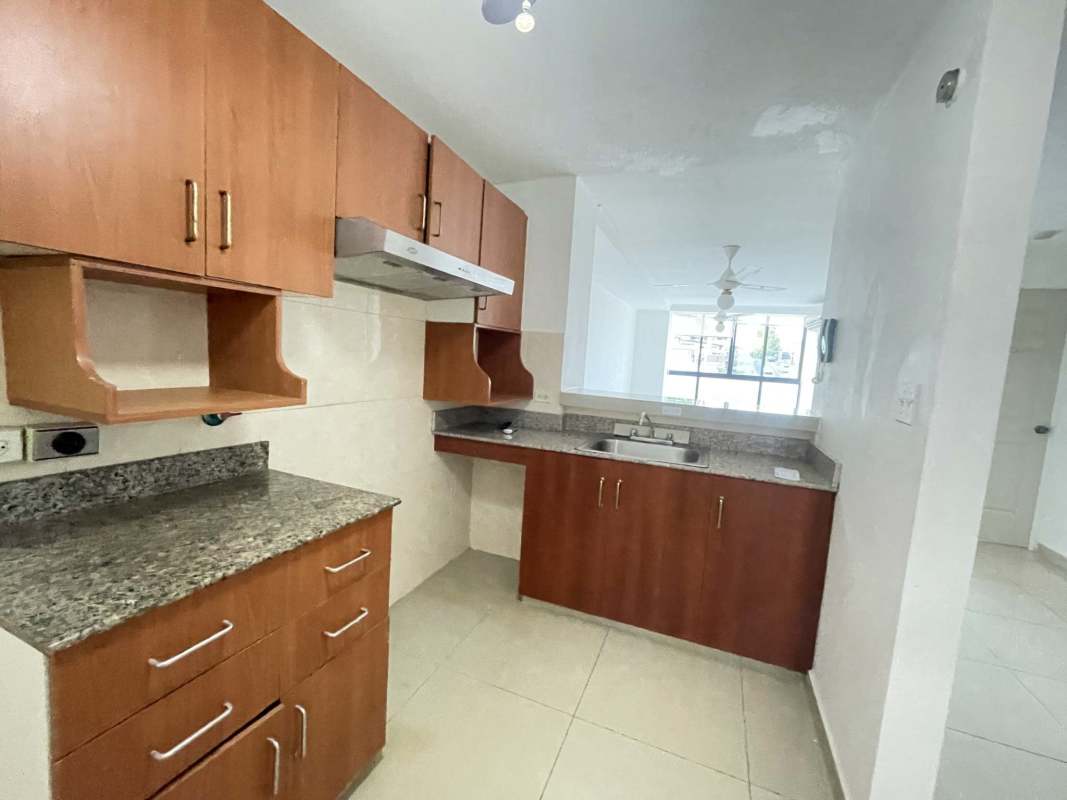 Bathroom with pedestal sink walk-in shower tile walls PH Torre El Ingenio Betania Panama