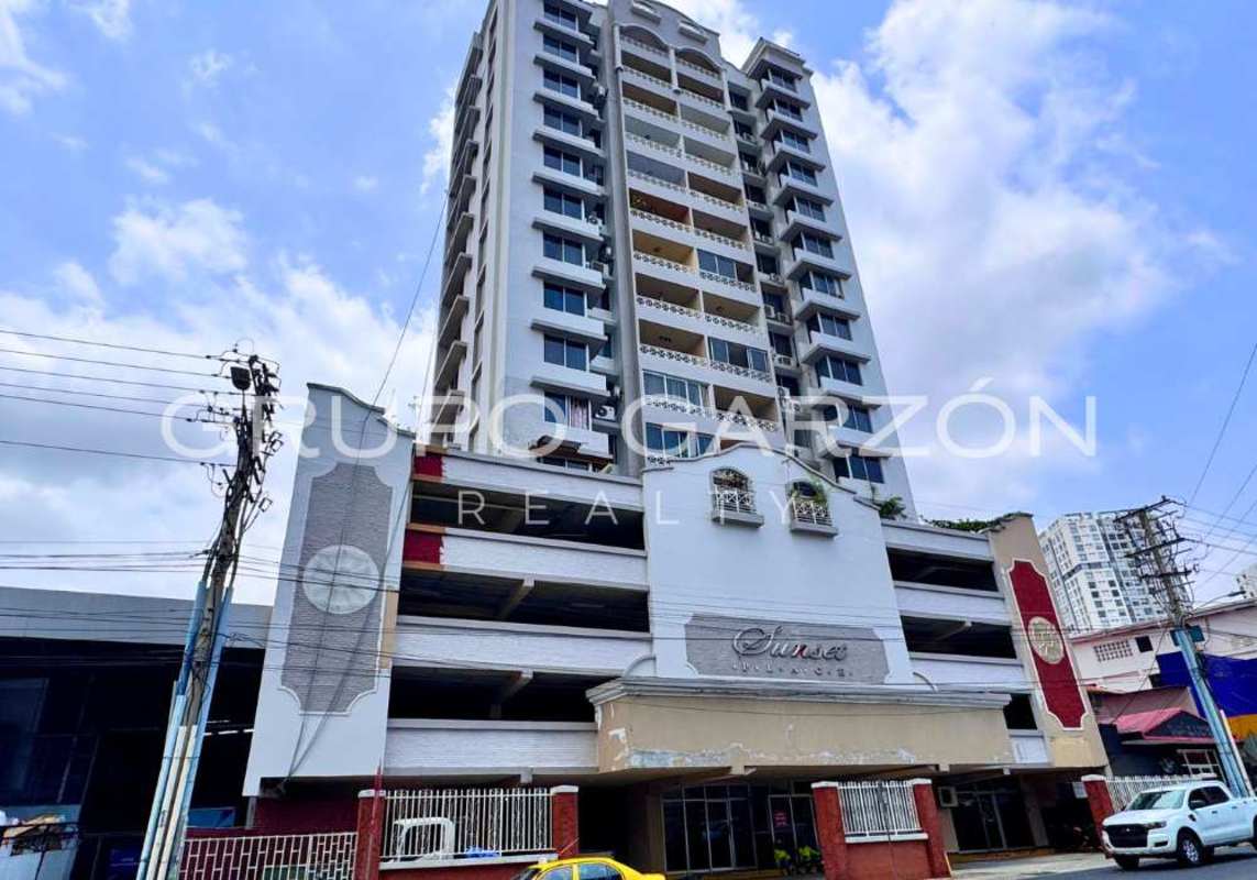 Exterior view of PH Sunset Place condo building with balconies on Via Porras Panama City