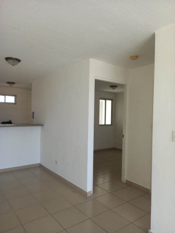 Empty tiled bedroom with natural light PH Rio La Plata Rio Abajo