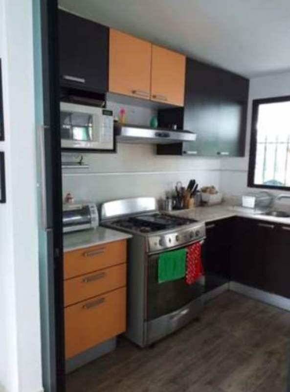 Living area with large windows, tiled floors, bright space Betania Panama