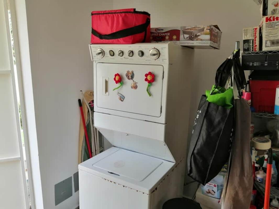 Living room with large windows, tiled floors and staircase in gated community house Clayton Panama